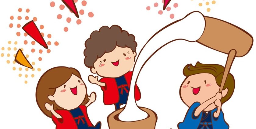 3人が楽しそうに餅つきをしています